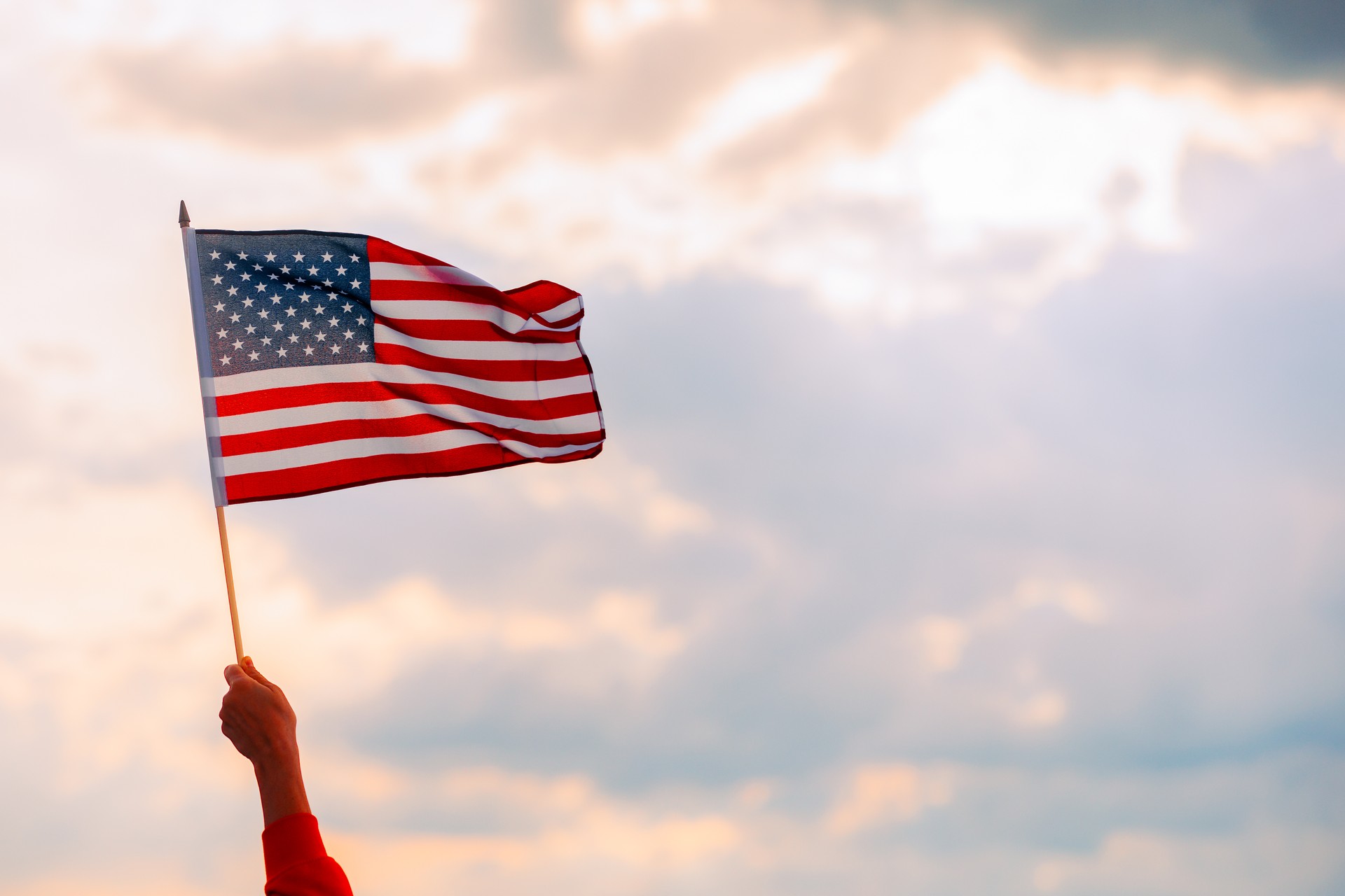 Hand Waving the Flag of the United Stated of America